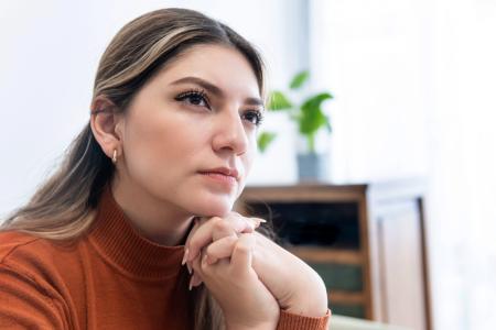 Woman contemplating what it means to be walking in God's Will with discernment, humility, and obedience