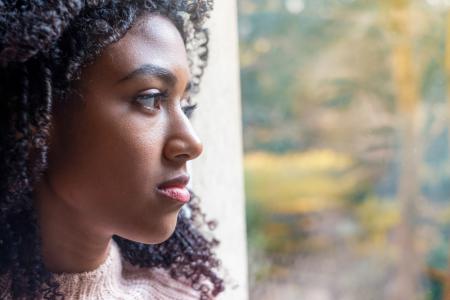 Young woman who wants to be walking in God's will without duplicity or hypocrisy but in obedience surrendering to the lordship of the God of her salvation