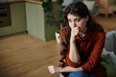 Woman asking herself can you live for Jesus as contemplates her commitment, surrender, and salvation